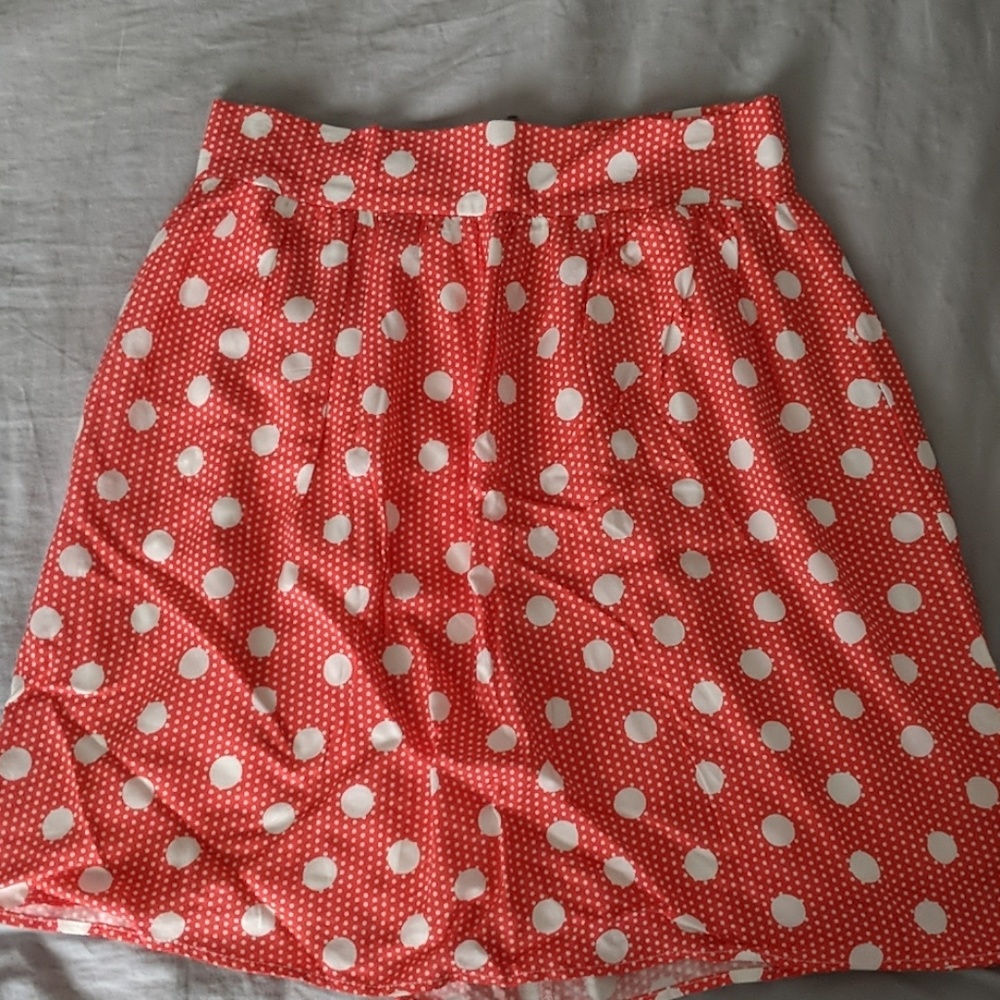 Red skirt with white polka dots
